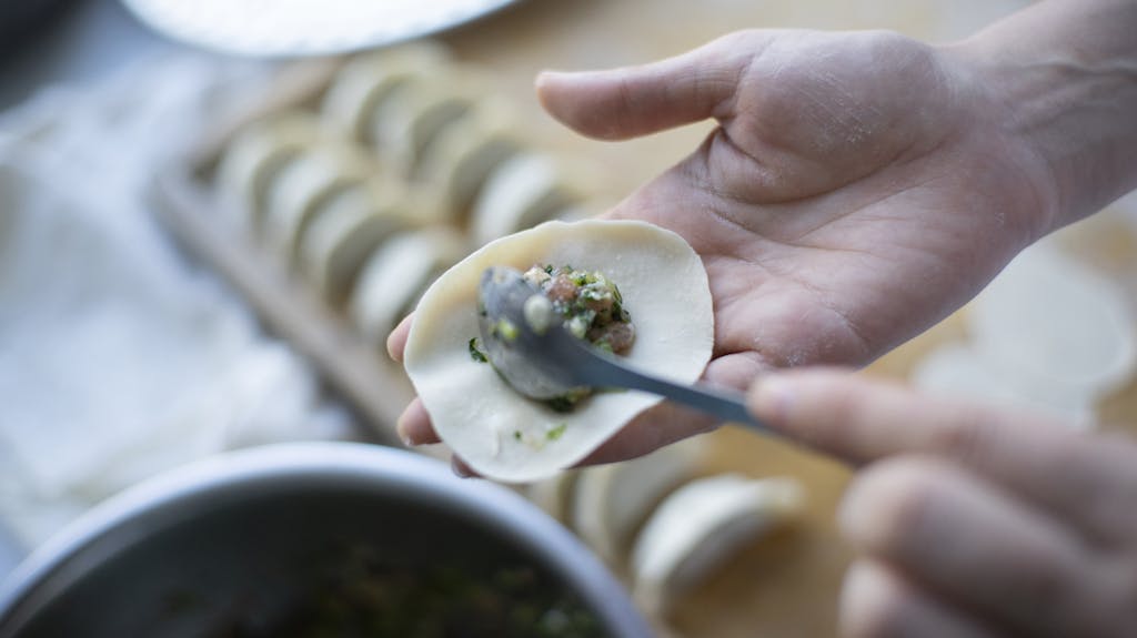 Person Making Dumpling